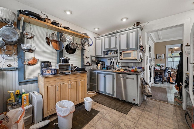 721 N St, Lake Geneva, WI 53147 - kitchen with white microwave, dark countertops, dishwasher, and a sink