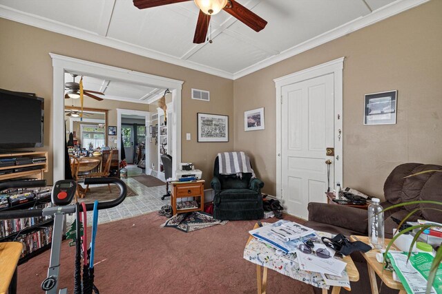 721 N St, Lake Geneva, WI 53147 - living room with visible vents, ornamental molding, carpet, and ceiling fan