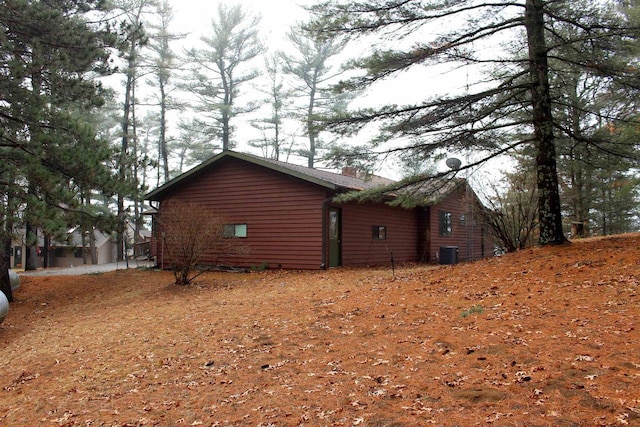 1885 20th Ave, Arkdale, WI 54613 - view of side of home with cooling unit and a chimney