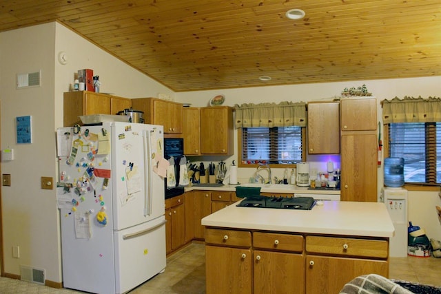 1885 20th Ave, Arkdale, WI 54613 - kitchen with freestanding refrigerator, wood ceiling, light countertops, a sink, and black gas cooktop