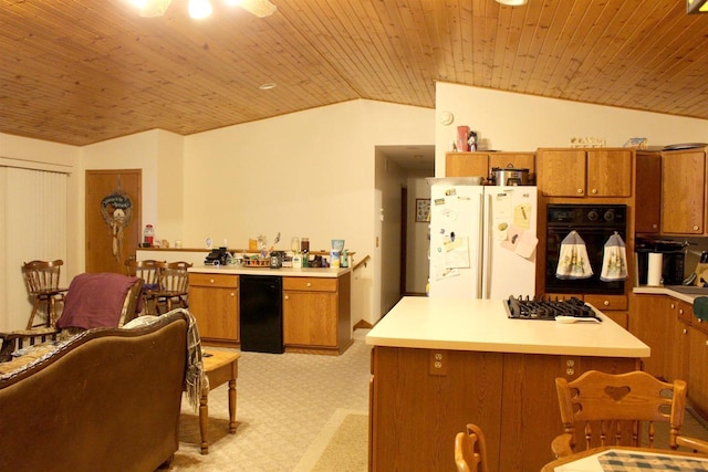 1885 20th Ave, Arkdale, WI 54613 - kitchen featuring black oven, lofted ceiling, freestanding refrigerator, brown cabinets, and light countertops