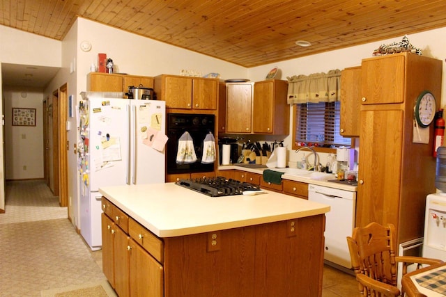 1885 20th Ave, Arkdale, WI 54613 - kitchen featuring white appliances, wood ceiling, brown cabinets, a center island, and light countertops