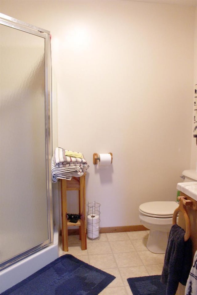 1885 20th Ave, Arkdale, WI 54613 - bathroom featuring a shower stall, toilet, vanity, and baseboards