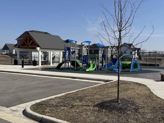 901 Westbridge Ct, Waunakee, WI 53597 - community play area featuring fence and a residential view