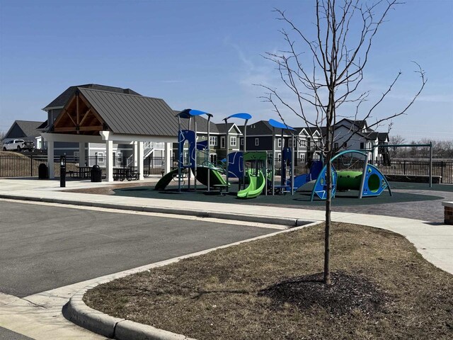 901 Westbridge Ct, Waunakee, WI 53597 - communal playground featuring fence and a residential view