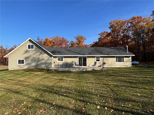 8160 Waldora Rd, Siren, WI 54872 - back of house with a lawn and a patio
