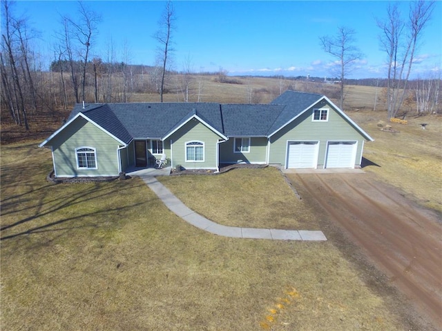 8160 Waldora Rd, Siren, WI 54872 - single story home featuring a front lawn, driveway, a shingled roof, and an attached garage