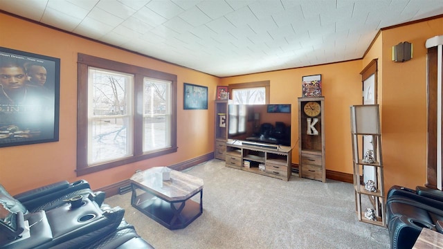 813 Main St, Black River Falls, WI 54615 - living room featuring baseboards, carpet floors, and ornamental molding