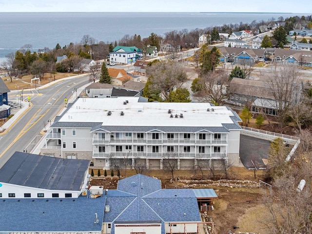 aerial view featuring a residential view and a water view