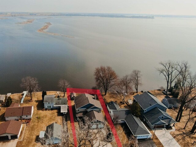 aerial view featuring a water view and a residential view
