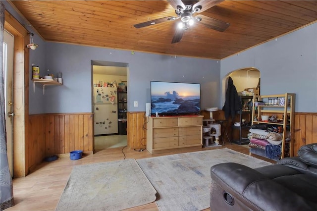 905 Lewis Ave, Cameron, WI 54822 - living area with a wainscoted wall, wooden ceiling, wood finished floors, wood walls, and ceiling fan