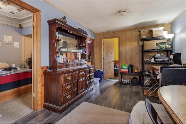 905 Lewis Ave, Cameron, WI 54822 - office featuring a textured ceiling, wood walls, and dark wood finished floors