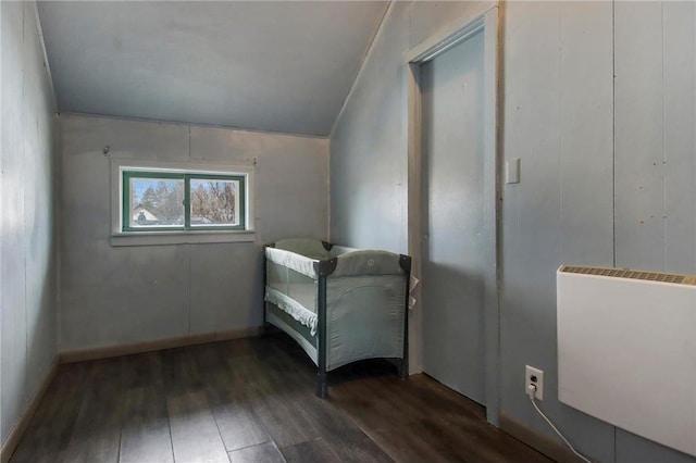 905 Lewis Ave, Cameron, WI 54822 - unfurnished bedroom featuring vaulted ceiling and wood finished floors