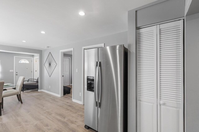33110 Store St, Burlington, WI 53105 - kitchen featuring light wood-style flooring, stainless steel refrigerator with ice dispenser, baseboards, and recessed lighting