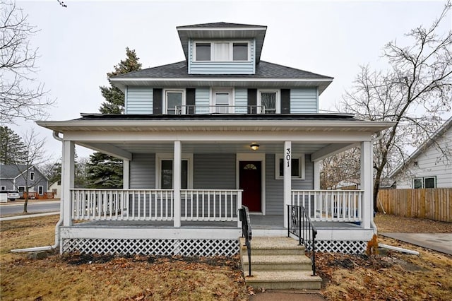 301 Summit St, Spooner, WI 54801 - view of front of property featuring covered porch and fence