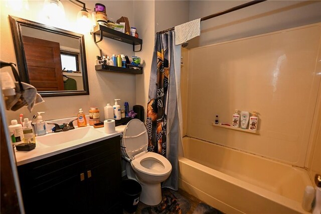 301 Summit St, Spooner, WI 54801 - bathroom featuring toilet, vanity, and shower / bathtub combination with curtain