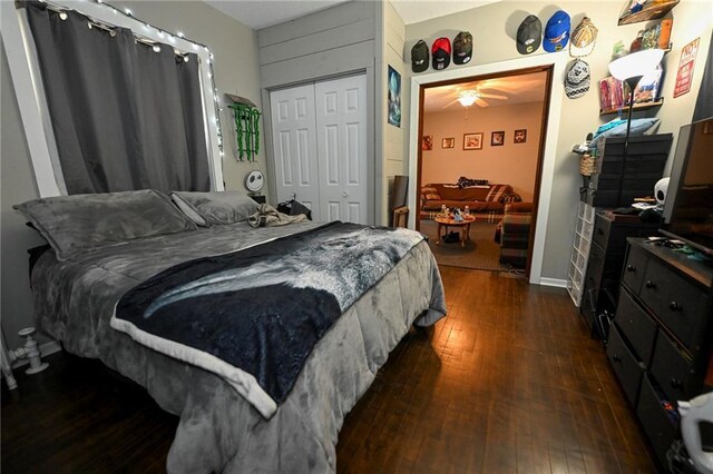 301 Summit St, Spooner, WI 54801 - bedroom featuring a closet and dark wood-type flooring
