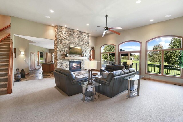 7548 Fallen Oak Dr, Verona, WI 53593 - living area with carpet floors, plenty of natural light, stairway, and ceiling fan