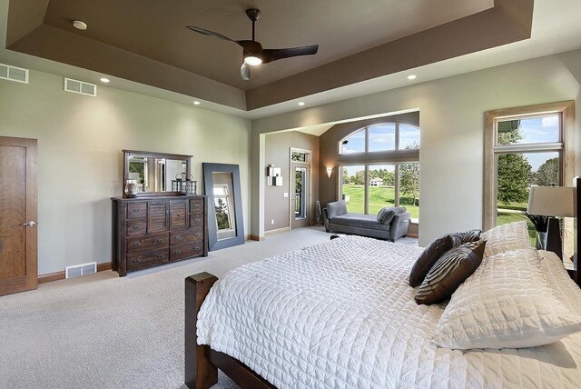 7548 Fallen Oak Dr, Verona, WI 53593 - bedroom with visible vents and a raised ceiling