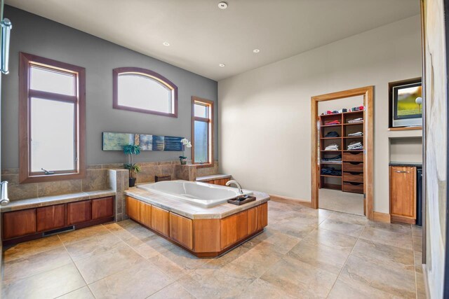 7548 Fallen Oak Dr, Verona, WI 53593 - full bathroom featuring a bath and a spacious closet