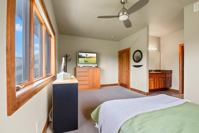 7548 Fallen Oak Dr, Verona, WI 53593 - bedroom featuring carpet flooring, baseboards, a sink, visible vents, and a ceiling fan