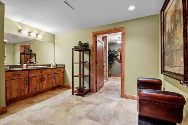 7548 Fallen Oak Dr, Verona, WI 53593 - bathroom featuring baseboards, visible vents, recessed lighting, and vanity