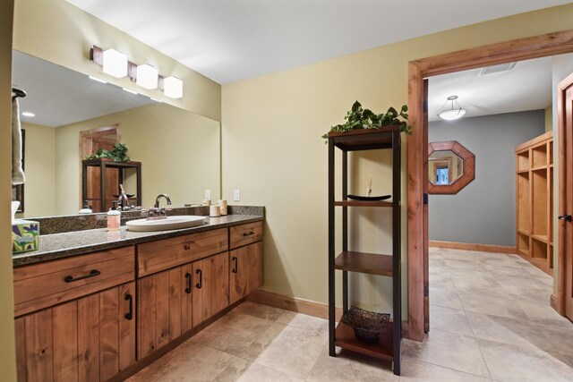 7548 Fallen Oak Dr, Verona, WI 53593 - bathroom with vanity and baseboards