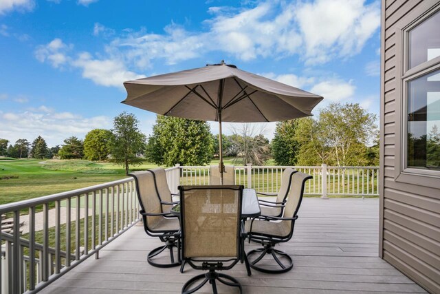 7548 Fallen Oak Dr, Verona, WI 53593 - wooden terrace featuring outdoor dining area and a lawn