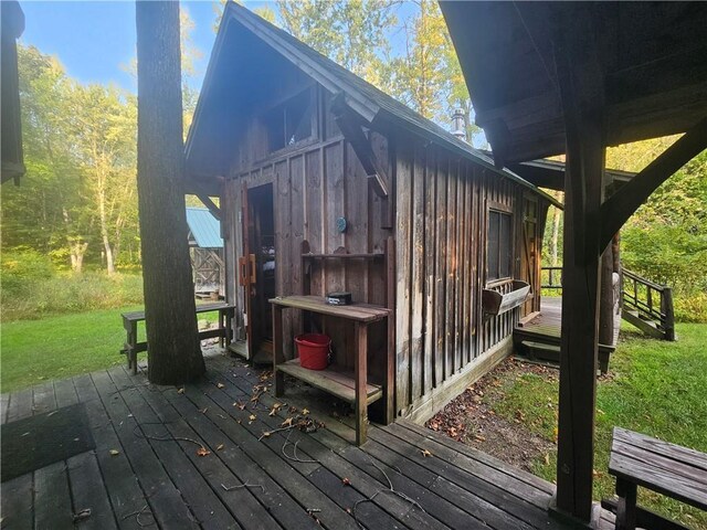 W16099 Manglos Ave, Sheldon, WI 54766 - wooden terrace with an outdoor structure
