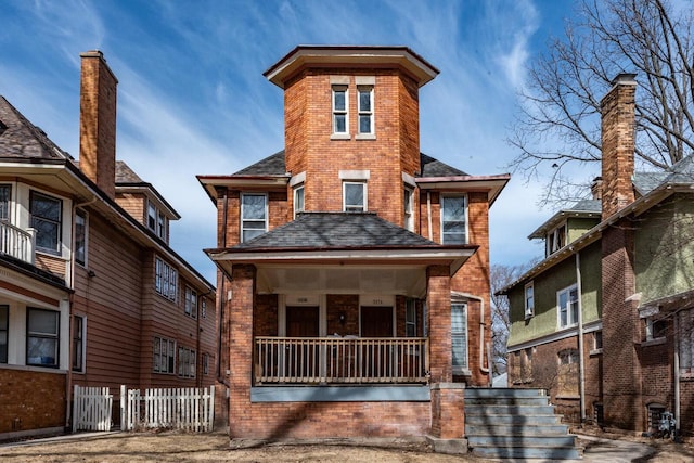 3034 W State St Unit 3036, Milwaukee, WI 53208 - view of front of house with a shingled roof, a porch, fence, and brick siding