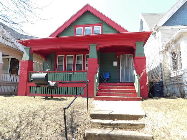 3007 N 29th St, Milwaukee, WI 53210 - view of front of property featuring a porch and brick siding