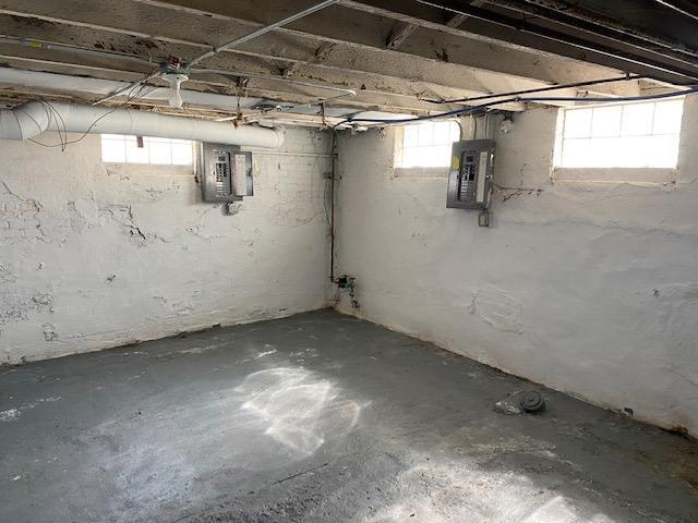 basement with electric panel