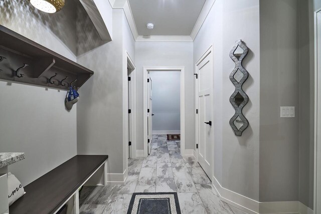 2721 Woodfield Ct, Howard, WI 54313 - mudroom featuring marble finish floor, crown molding, and baseboards