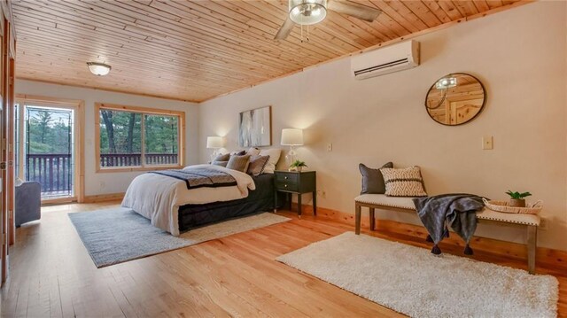 E19535 County Road Nd, Augusta, WI 54722 - bedroom with access to exterior, a wall mounted AC, wood finished floors, and wood ceiling