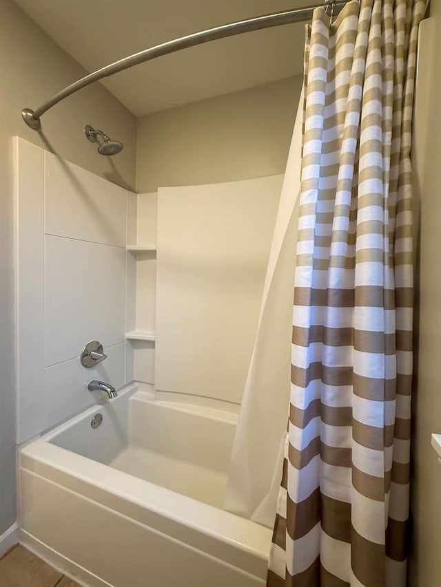 2208 W Milwaukee St, Stoughton, WI 53589 - bathroom featuring shower / bath combination with curtain