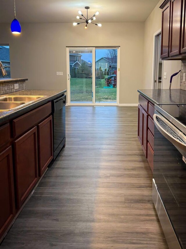 2208 W Milwaukee St, Stoughton, WI 53589 - kitchen with a chandelier, stainless steel electric range oven, a sink, dark countertops, and dishwasher