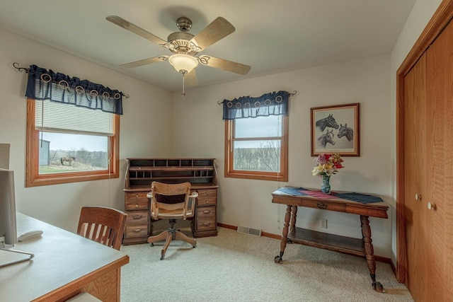 5995 Section Line Rd, Dodgeville, WI 53533 - office featuring visible vents, baseboards, a ceiling fan, and light carpet