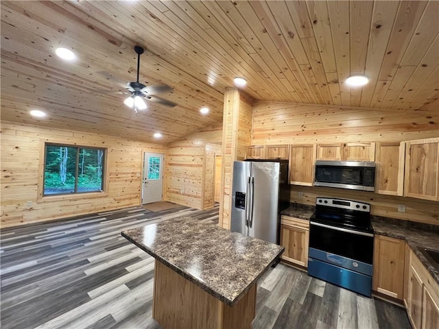 5830N Mutters Rd, Stone Lake, WI 54876 - kitchen featuring wooden ceiling, wooden walls, light brown cabinetry, lofted ceiling, and stainless steel appliances