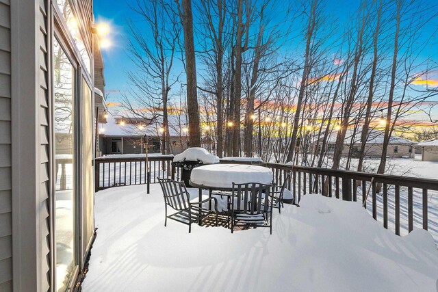 view of snow covered deck