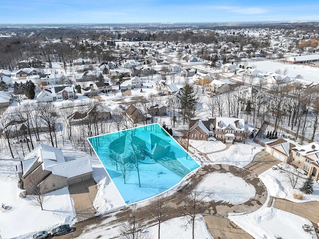 view of snow covered pool