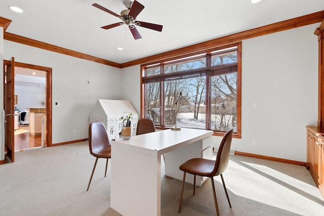 office space with baseboards, ceiling fan, crown molding, recessed lighting, and light carpet