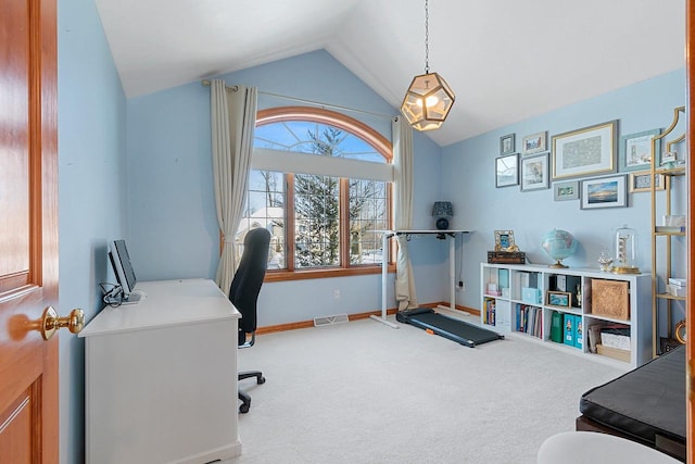 office area with visible vents, carpet flooring, baseboards, and lofted ceiling