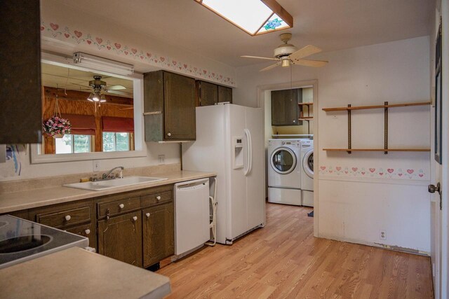 1930 Czech Ave, Arkdale, WI 54613 - kitchen featuring washer and clothes dryer, a sink, a ceiling fan, and white appliances