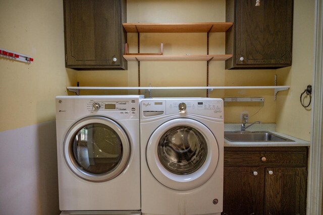 1930 Czech Ave, Arkdale, WI 54613 - washroom featuring cabinet space, a sink, and washer and clothes dryer