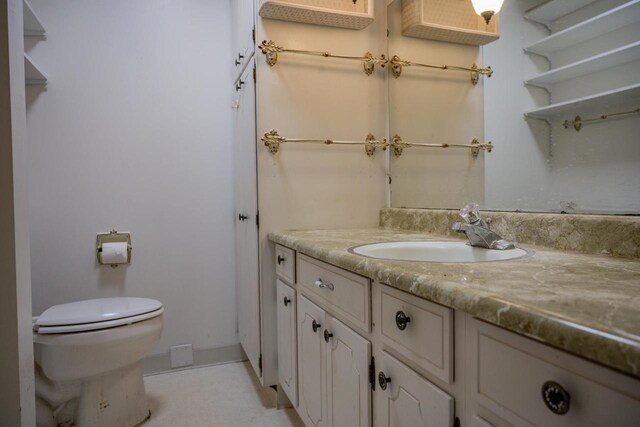 1930 Czech Ave, Arkdale, WI 54613 - bathroom with toilet, vanity, and baseboards