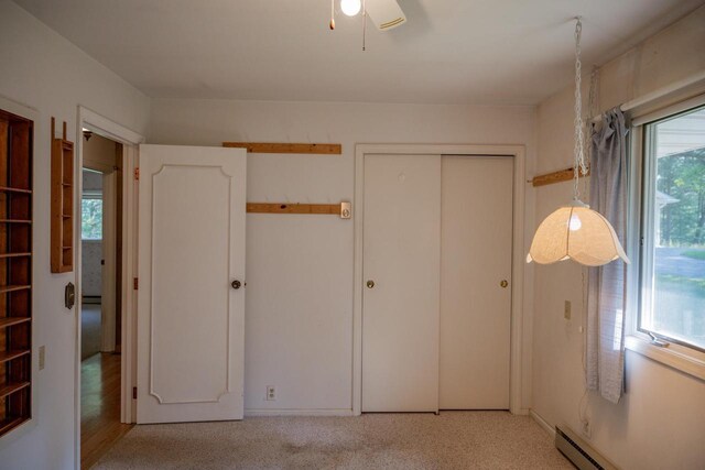 1930 Czech Ave, Arkdale, WI 54613 - unfurnished bedroom featuring a ceiling fan and baseboard heating