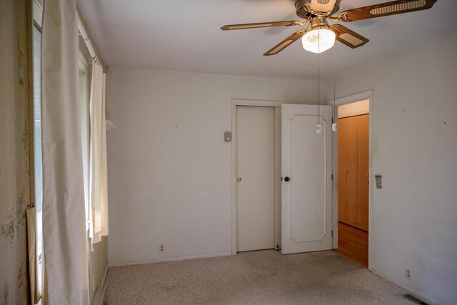1930 Czech Ave, Arkdale, WI 54613 - unfurnished bedroom featuring visible vents, ceiling fan, and carpet