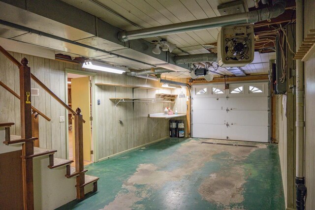 1930 Czech Ave, Arkdale, WI 54613 - garage featuring wood walls and a garage door opener