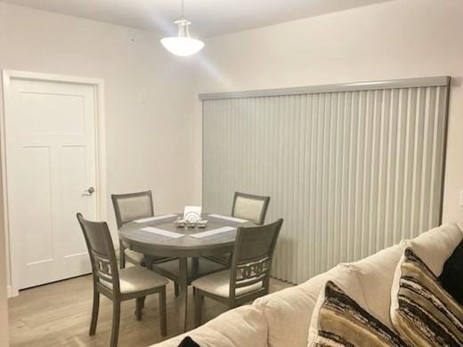 1501 N Windsor Ave Unit 205, Cottage Grove, WI 53527 - dining room featuring light wood-style flooring