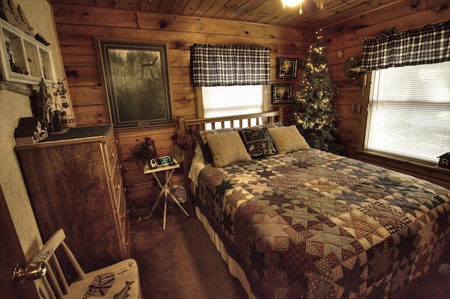 N16180 Deerfield Dr, Nekoosa, WI 54457 - bedroom featuring wooden ceiling and wood walls
